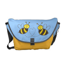 Abeilles de miel avec le coeur sacoches