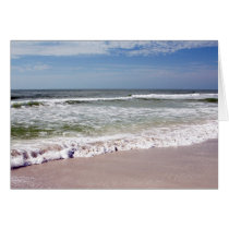 Accident de vagues sur la plage sablonneuse cartes