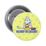 accroché sur le crochet pin's