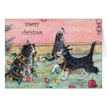 Aidant avec les lumières, chiens, carte de Noël