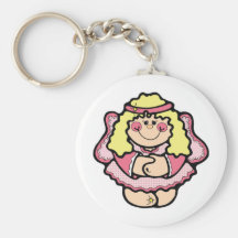 Ange heureux de petite fille souriant dans le rose porte-clef