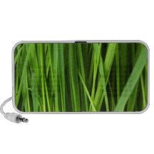 Arrière - plan d'herbe verte haut-parleur portable