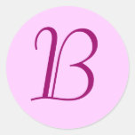 Autocollant initial décoré d'un monogramme mauve r