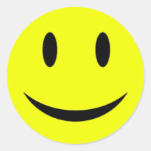Autocollant souriant jaune de visage
