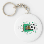 ballon de football traversant le champ porte-clés