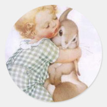 Bébé étreignant le lapin de Pâques Adhésifs