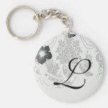 blanc de roses de damassé et black.ai porte-clés