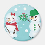 Bonhomme de neige avec le gui voulant un baiser aimant