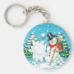 Bonhomme de neige jetant un floc d'amusement d'hiv porte-clé