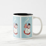 Bonhomme de neige sur le disque de neige mugs