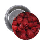 Bouton de framboises rouges badge