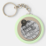 Boutons et parenthèses verts Keychain Porte-clés