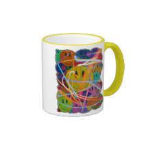 Boutons souriants de visage tasse à café