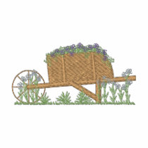Brouette de roue avec des fleurs polos brodés