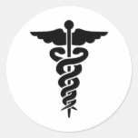 Caducée médical de symbole adhésif rond