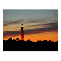 Carte postale orange de ciel de sorbet de phare d'
