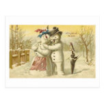 Carte vintage de bonhomme de neige et de femme de  carte postale