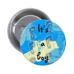 C'est un garçon badges avec agrafe