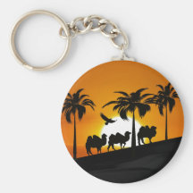 Chameaux de désert au coucher du soleil porte-clef