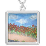 Champ des fleurs rouges colliers