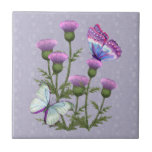 Chardons et papillons sur le mauve carreaux