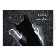 Chasse de la carte de chaton de Noël de flocons de