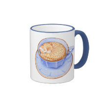 Chat dans la tasse de café