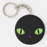 Chat noir avec de grands yeux verts porte-clés