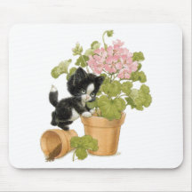Chat vilain mignon - chaton dans un pot de fleurs tapis de souris