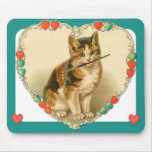 Chaton de calicot au coeur tapis de souris