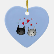 Chats noirs et gris mignons, avec des coeurs ornements de noël