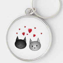 Chats noirs et gris mignons, avec des coeurs porte-clefs