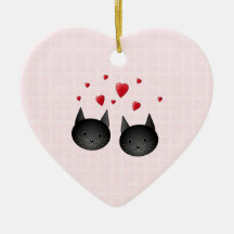 Chats noirs mignons avec des coeurs, sur pâle - ro ornements