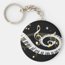 Clés de piano et notes d'or de musique porte-clef