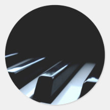 Clés noires et blanches de piano autocollants ronds