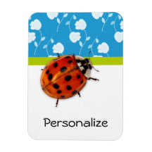 Coccinelle florale bleue à la mode avec le nom magnet