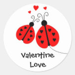 Coccinelles dans des autocollants de Valentine d'a