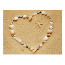 Coeur de coquillage avec la carte postale d'étoile