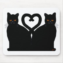 Coeur lumineux de yeux tapis de souris