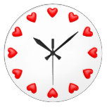 Coeurs rouges sur le blanc horloges