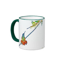 Colibri et tasse d'art de feuille