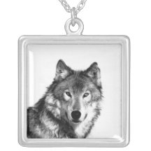 Collier pendant de loup noir et blanc