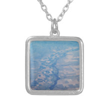 Collier piqué de paysage
