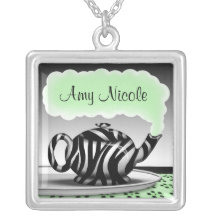 Collier vert et noir de théière d'impression de zè