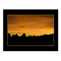 Collines de prairie au coucher du soleil cartes postales