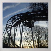 Coucher du soleil au parc d'attractions posters