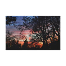 Coucher du soleil par les arbres toiles tendues sur châssis