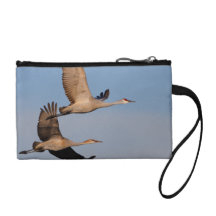 couples de grue de sandhill en vol portefeuille