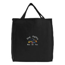 Course d'agilité de chien pour le sac brodé par ob