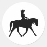 Cow-girl montant son cheval autocollants ronds